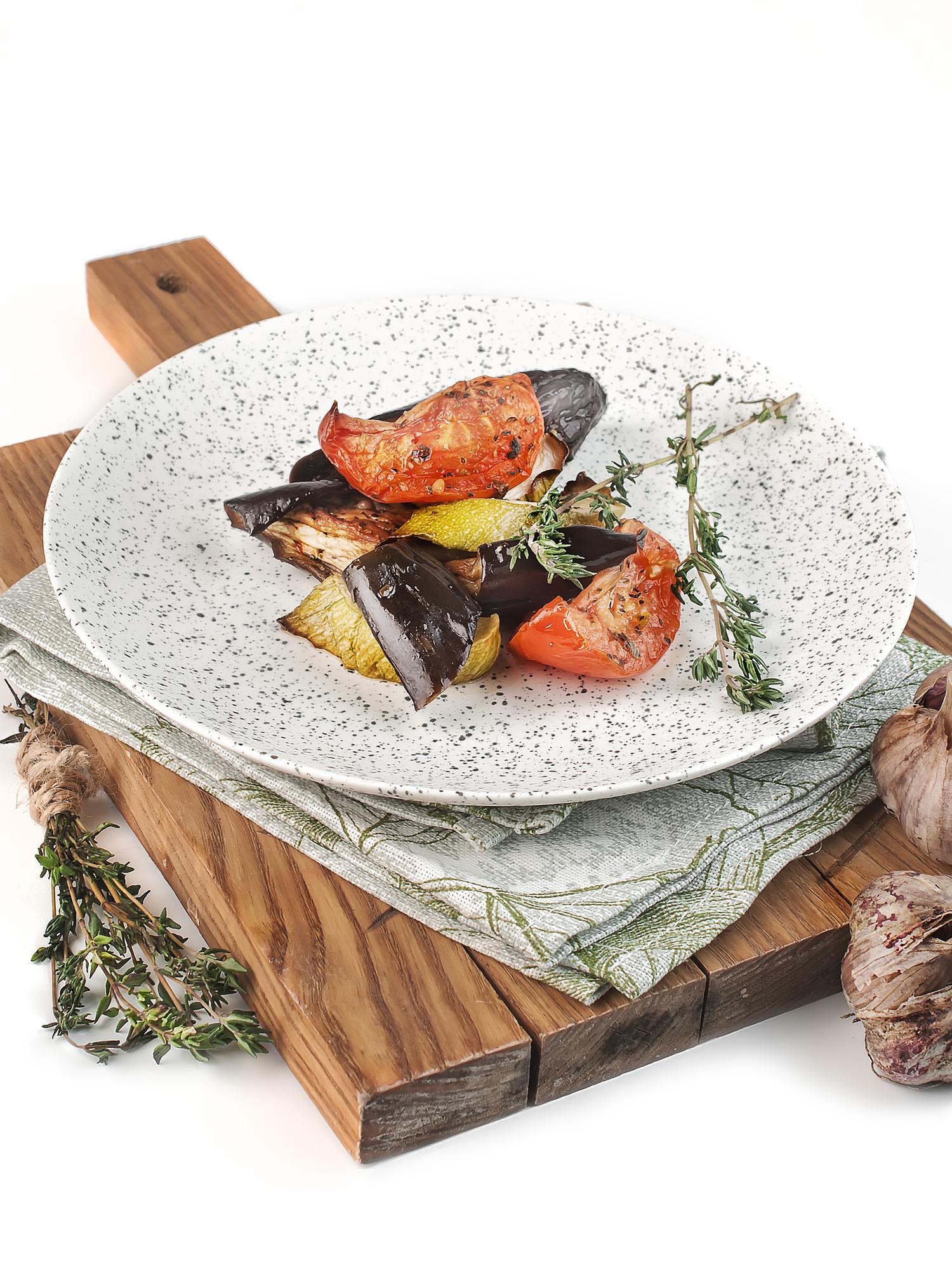 Large spread of prepared dishes on wooden table